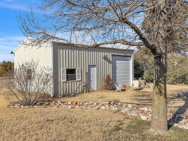 view of outdoor structure featuring a garage