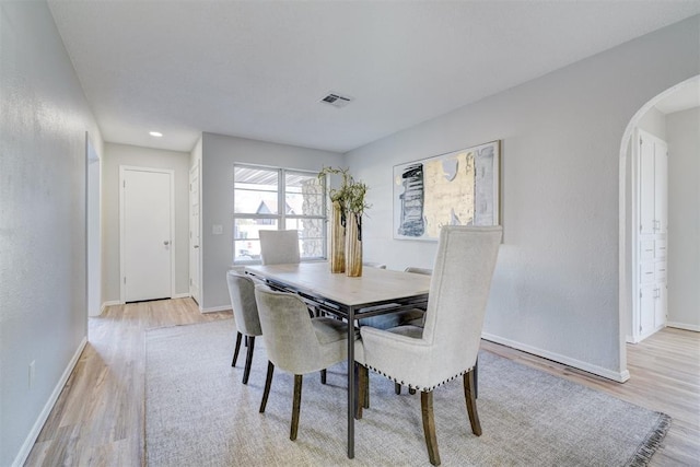 dining space featuring light hardwood / wood-style flooring