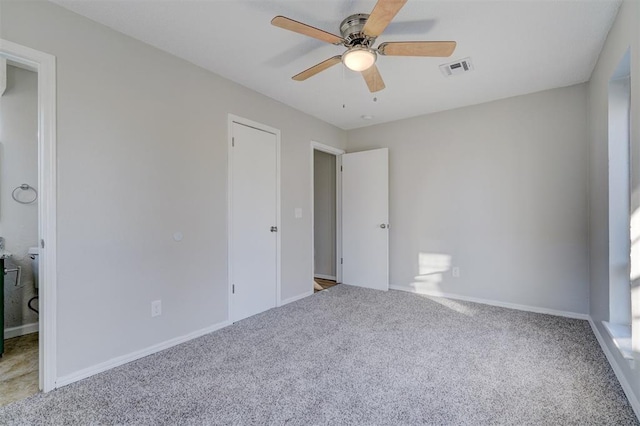 unfurnished bedroom with carpet flooring and ceiling fan