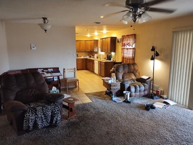 tiled living room featuring ceiling fan