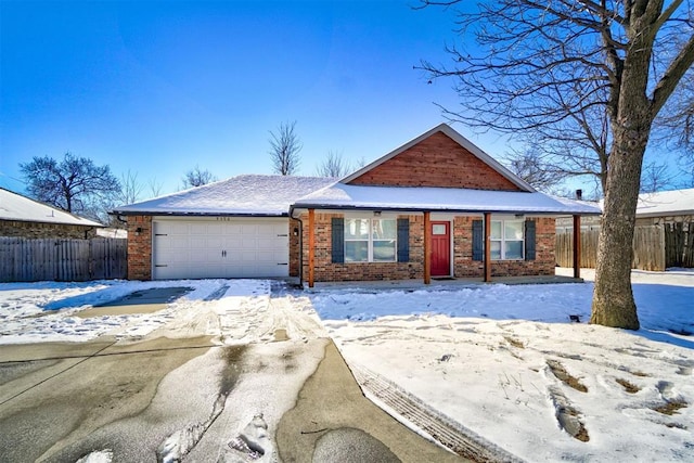 ranch-style home with a garage