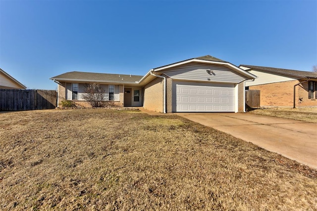 single story home with a garage and a front yard