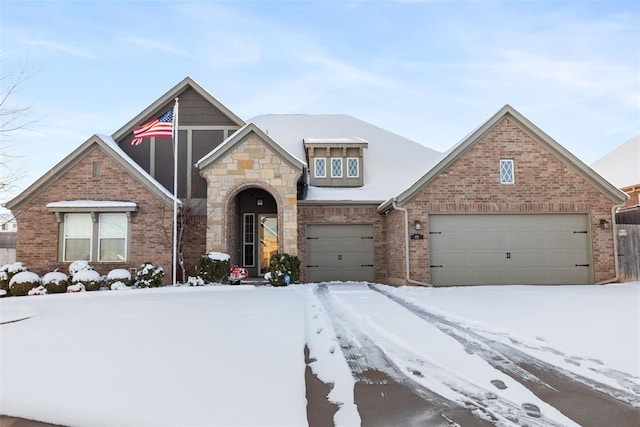 front of property with a garage