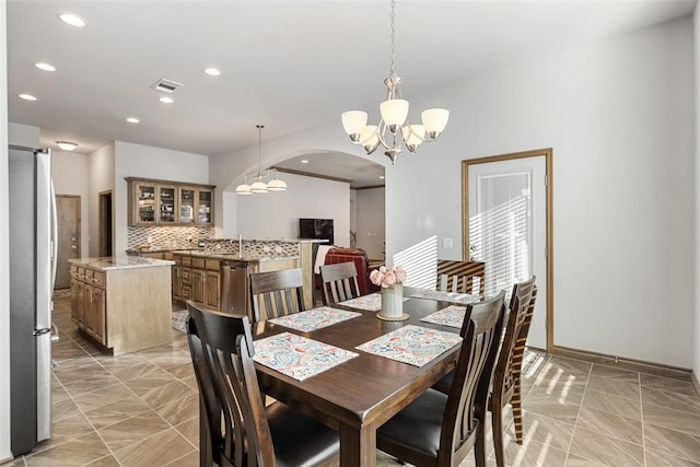 dining area with a chandelier