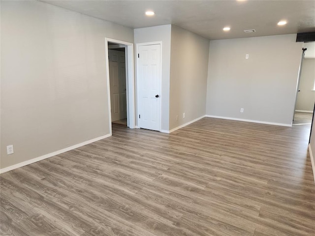 empty room featuring light hardwood / wood-style floors