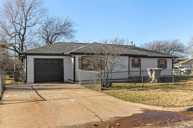 view of front facade with a front yard and a garage