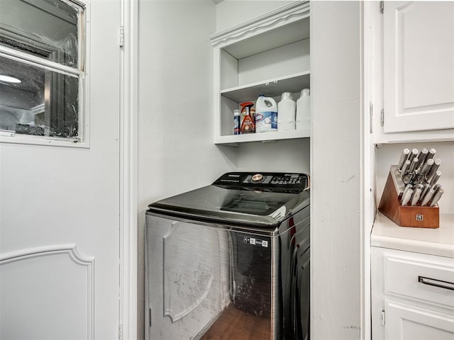 washroom featuring washer / dryer