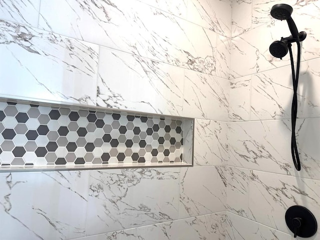 details with a tile shower