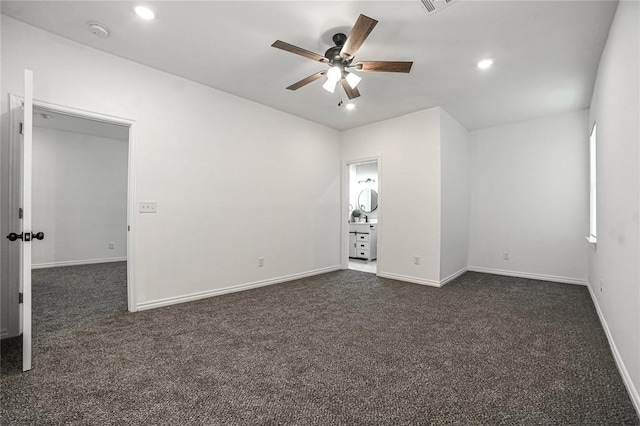 unfurnished room with baseboards, dark carpet, a ceiling fan, and recessed lighting