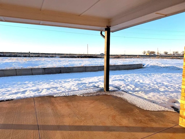 view of snow covered patio