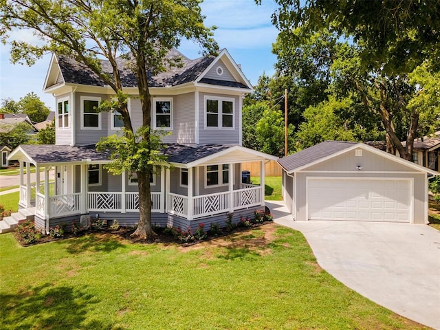 view of front of property featuring covered porch, a garage, an outdoor structure, and a front lawn