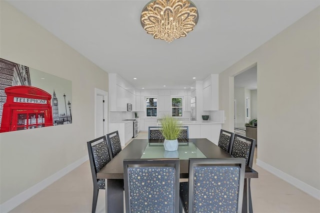 dining area with a notable chandelier