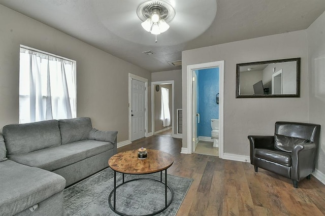 living room featuring dark hardwood / wood-style floors