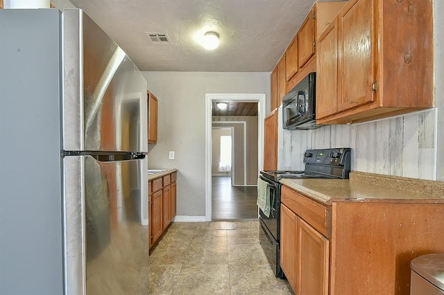 kitchen featuring black appliances