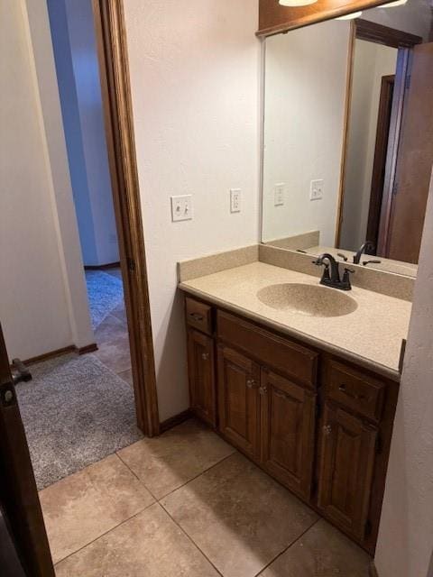 bathroom with vanity and tile patterned floors