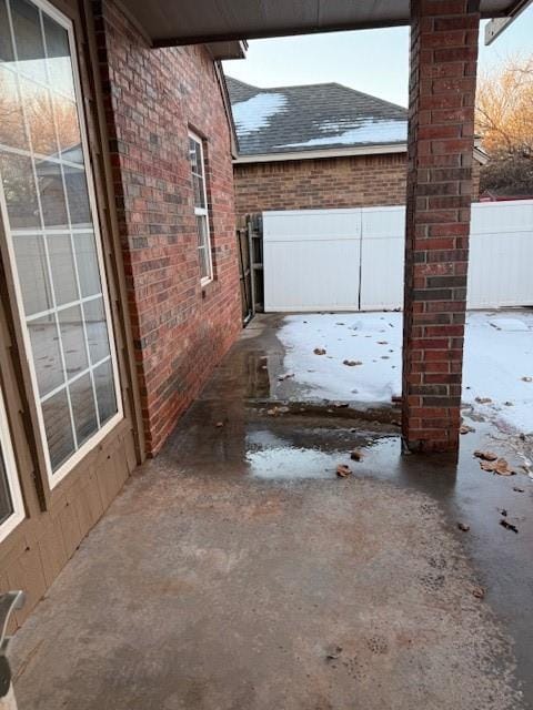 view of snow covered patio