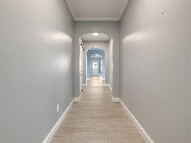 hallway with crown molding