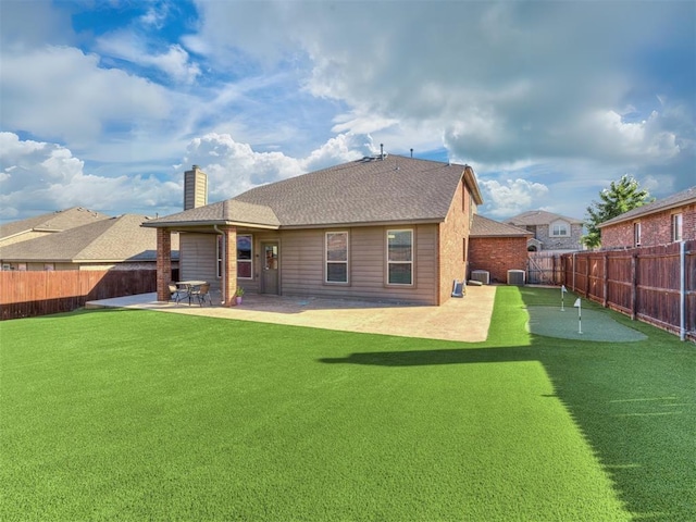 back of property with a patio area