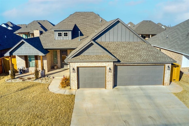 view of front facade featuring a garage and a front lawn