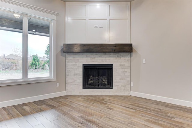 unfurnished living room with light hardwood / wood-style flooring