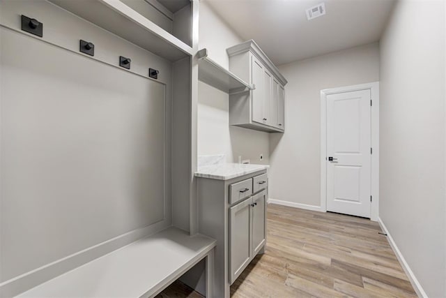 mudroom with light wood-type flooring