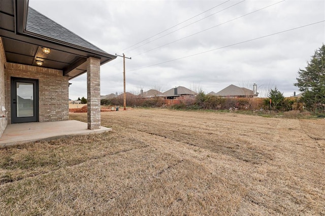 view of yard featuring a patio