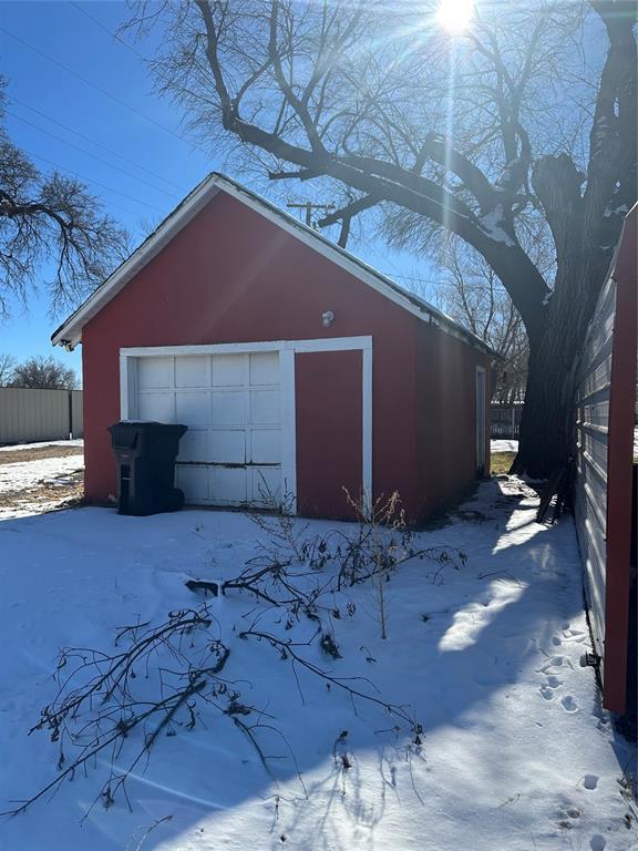 view of snow covered garage