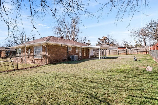 exterior space with central AC unit and a fenced backyard