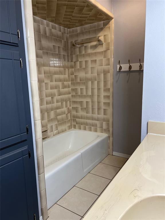 bathroom featuring tile patterned floors, vanity, and shower / bathing tub combination