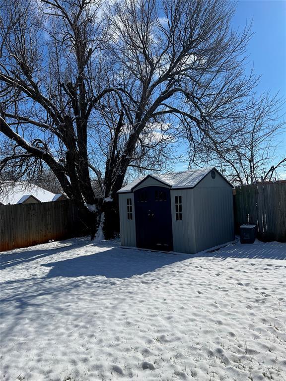 view of snow covered garage