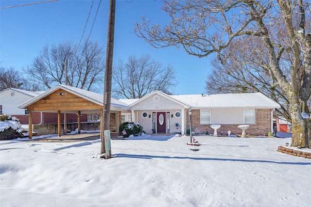 view of front of home with a carport