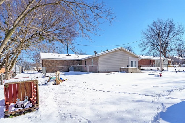 view of snow covered house