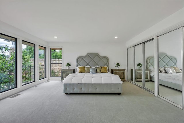 bedroom with light carpet