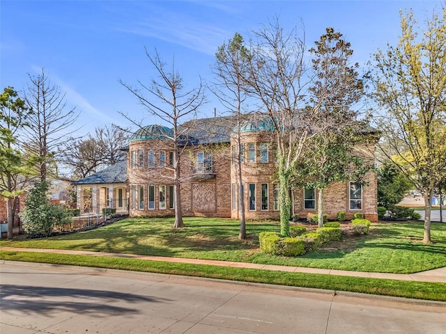 view of front of property with a front lawn