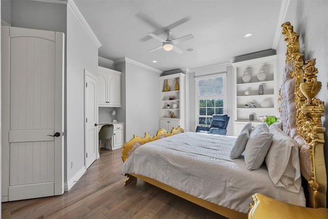 bedroom featuring dark hardwood / wood-style flooring, ceiling fan, and crown molding