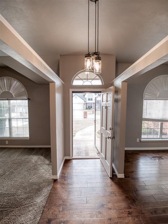 entrance foyer with dark hardwood / wood-style flooring