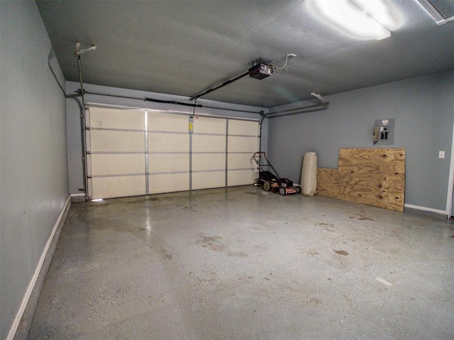 garage with electric panel and a garage door opener