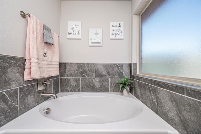 bathroom with a bathing tub