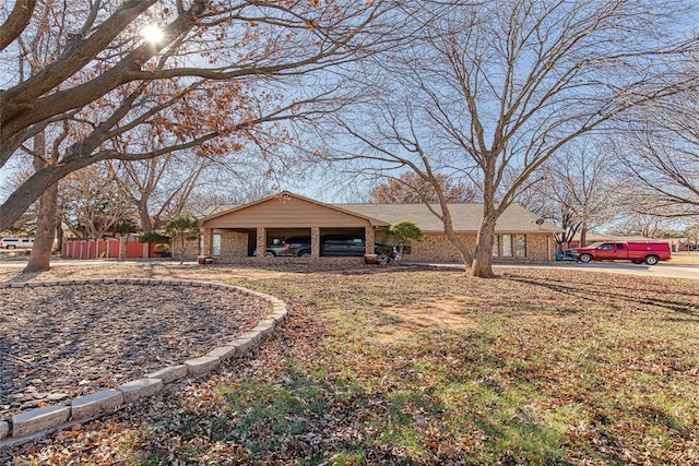 single story home with a carport