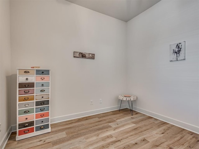 spare room featuring hardwood / wood-style floors