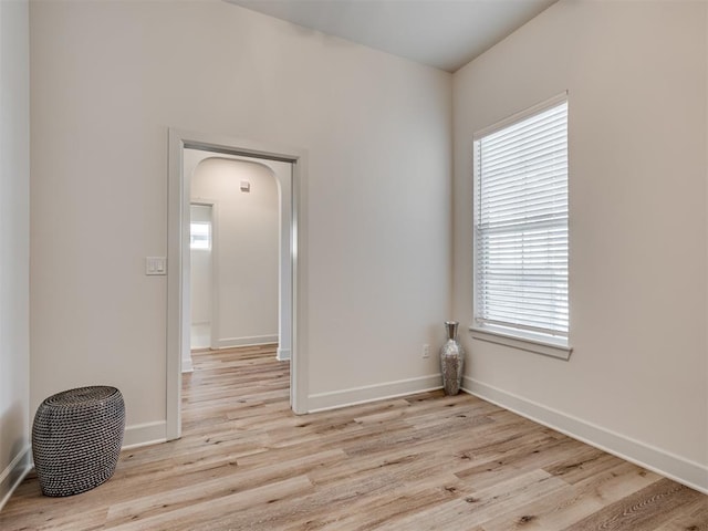 unfurnished room featuring light hardwood / wood-style flooring