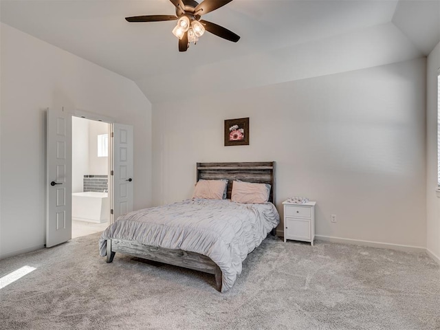 carpeted bedroom featuring connected bathroom, ceiling fan, and lofted ceiling