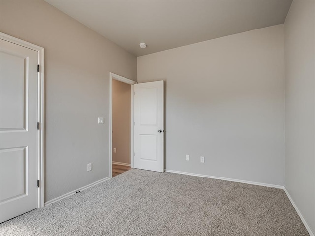 unfurnished bedroom featuring carpet