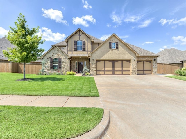 view of front facade featuring a garage and a front lawn