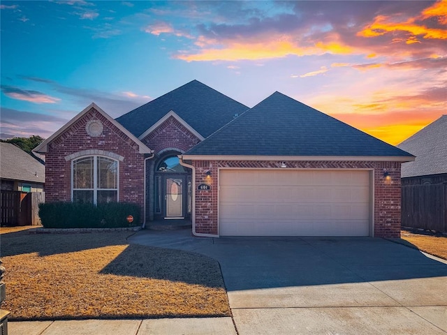 view of front of property featuring a garage