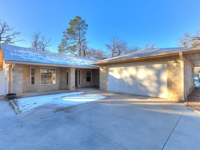 ranch-style home with a garage