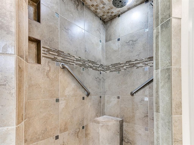 room details with a tile shower