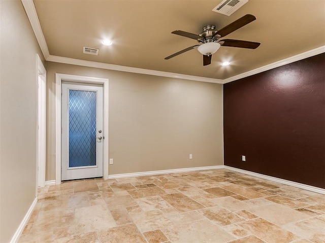 spare room featuring ceiling fan and crown molding