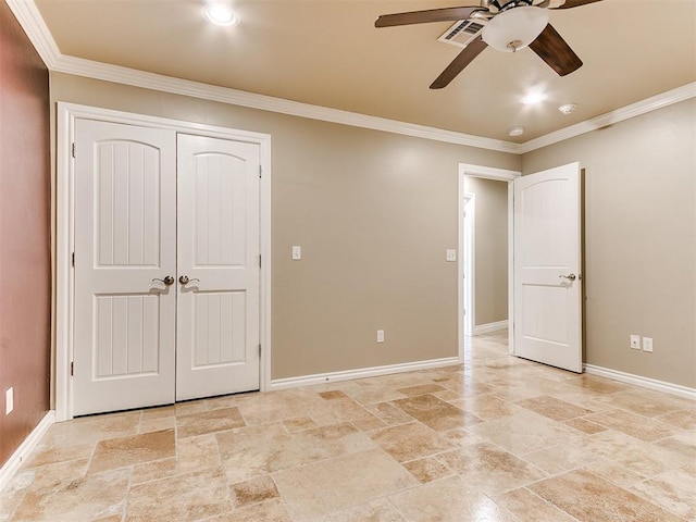 unfurnished bedroom with ceiling fan, ornamental molding, and a closet