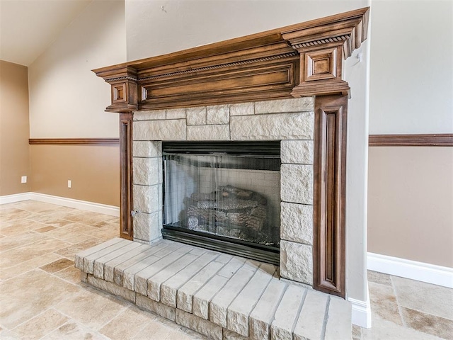 6704 Tall Oaks Dr, Oklahoma City, OK 73127 - detailed view of baseboards and a fireplace with raised hearth